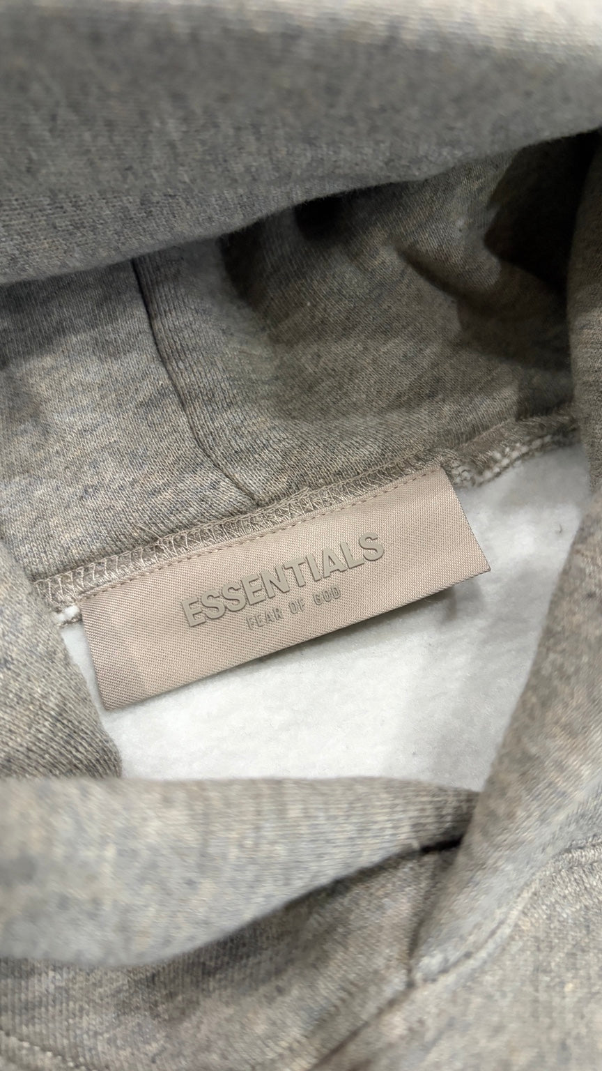 Dark Oatmeal Essentials hoodie interior label detail