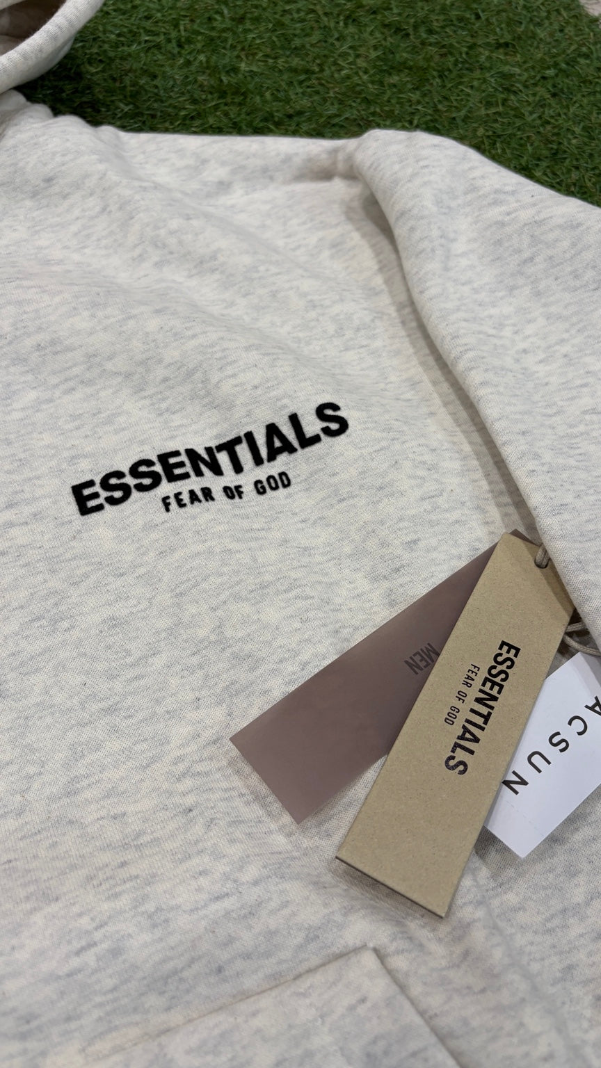 Light Oatmeal Essentials hoodie front logo detail