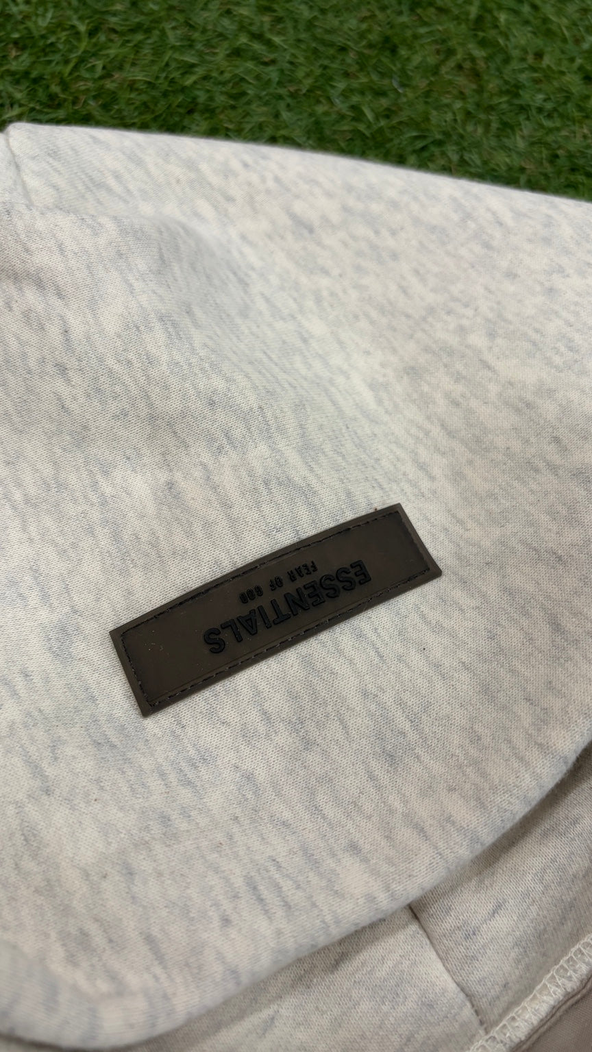 Light Oatmeal Essentials hoodie hood label detail