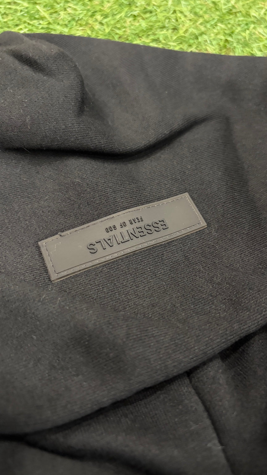 Black Essentials hoodie hood label detail
