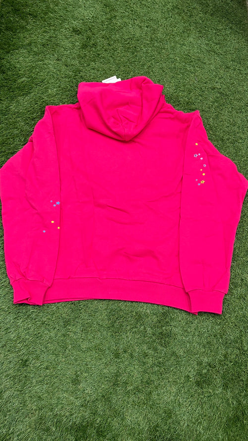 Hot pink graphic hoodie back with multicolor stars on sleeves
