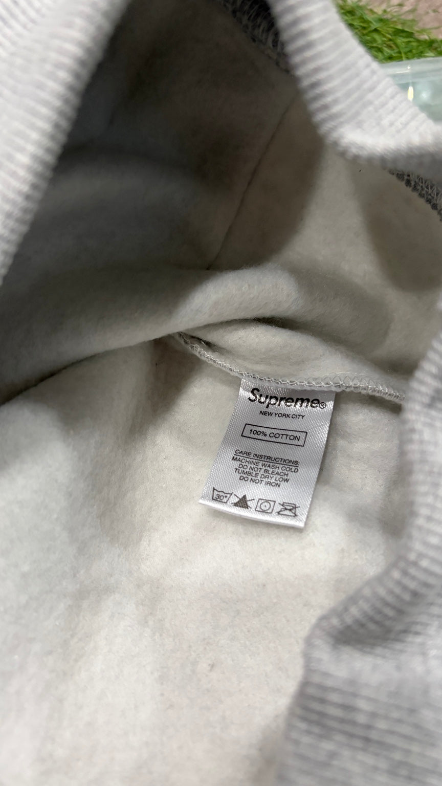 Supreme gray hoodie 100 percent cotton interior care tag