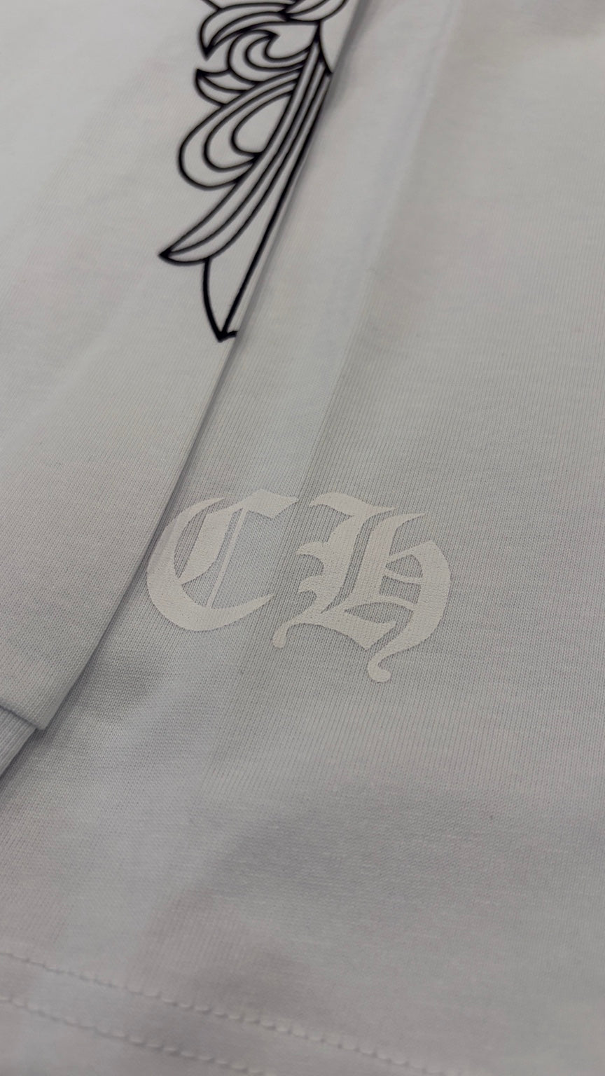 White CH lettering detail near hem