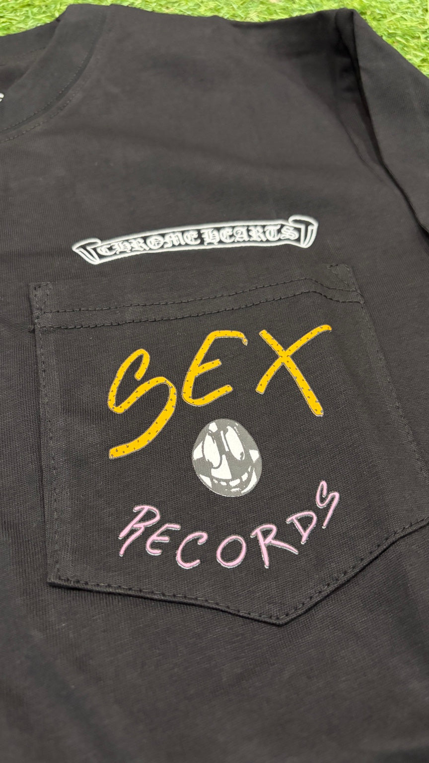 Sex Records chest pocket close-up
