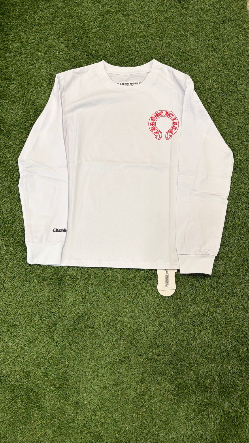 Full front of white long sleeve with red horseshoe chest graphic