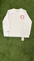 Full front of white long sleeve with red horseshoe chest graphic